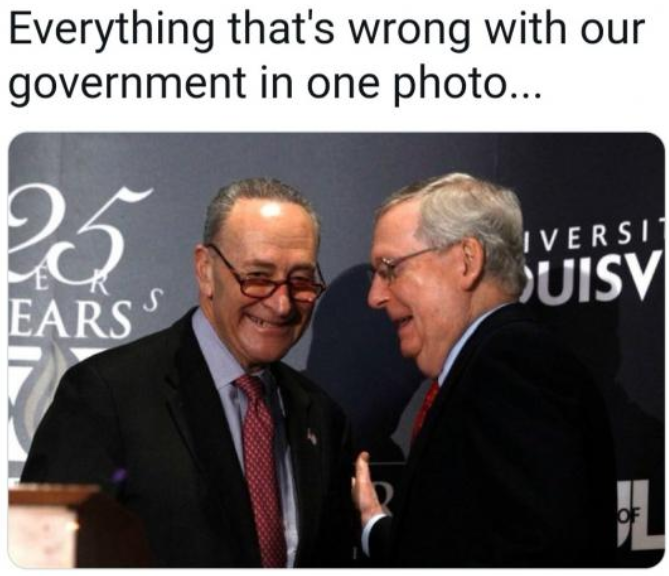 Schumer and McConnel whispering to each other.