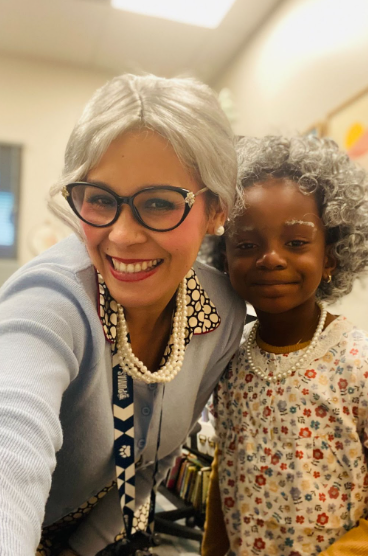 A teacher and student dressed up as 100 years old