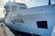 Close up shot of the bow of white NOAA Ship Reuben Lasker docked in San Diego, California