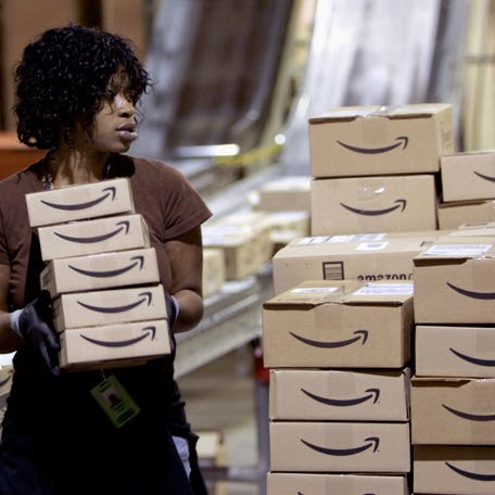 A worker at an Amazon warehouse in New Castle, Delaware. The number of part-time employees who prefer full-time jobs has been rising. REUTERS/Tim Shaffer (UNITED STATES)