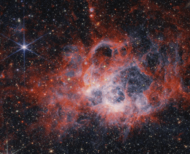 This is a JWST image of NGC 604, a star-forming region about 2.7 million light years from Earth. NASA/ESA/CSA/STScI