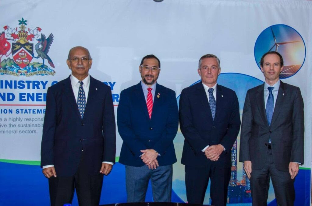 Allan Russell, business adviser, Perenco, left; Stuart Young, Energy Minister; Armel Simondin, group CEO, Perenco; and Gregoire de Courcelles, general manager, Perenco. - Photo courtesy MEEI