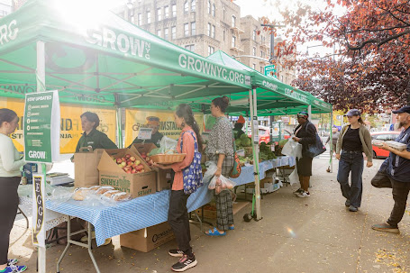 customers lined up at farmstand