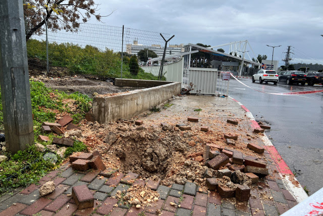 A view of the site where a rocket landed after it was fired from Lebanon, amid the ongoing conflict between Israel and the Palestinian Islamist group Hamas, near the entrance to a hospital in Safed, northern Israel February 14, 2024 (credit: REUTERS/Avi Ohayon)