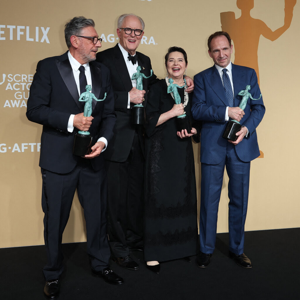 Four actors holding bronze SAG awards.