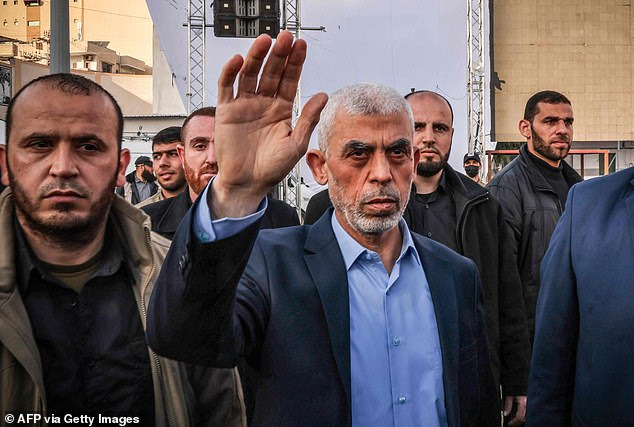 Yahya Sinwar waves to supporters as he arrives to attend a rally marking Al-Quds (Jerusalem) Day, a commemoration in support of the Palestinian people celebrated annually on the last Friday of the Muslim fasting month of Ramadan, in Gaza City, on April 14, 2023