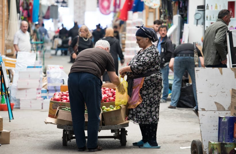 Street life at a bazar in Baku, the capital of Azerbaijan. October 14, 2019.  (credit: NATI SHOHAT/FLASH90)