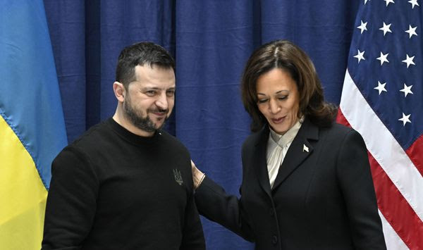 Ukrainian President Volodymyr Zelenskyy, left, and U.S. Vice President Kamala Harris pose at the end of a joint press conference at the Munich Security Conference (MSC) in Munich, Germany, Saturday Feb. 17, 2024. (Tobias Schwarz/Pool via AP)