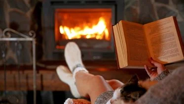 Reading by Fireplace