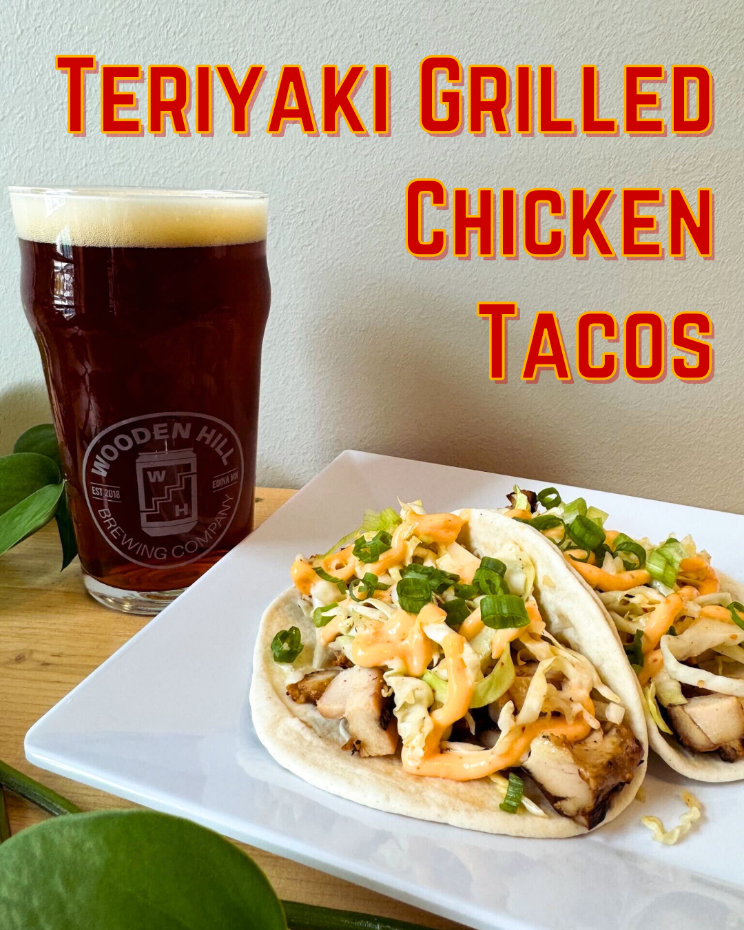 Picture of this week's taco special: Teriyaki Grilled Chicken Tacos! Tacos are plated on a white, square plate with a dark beer in the background.