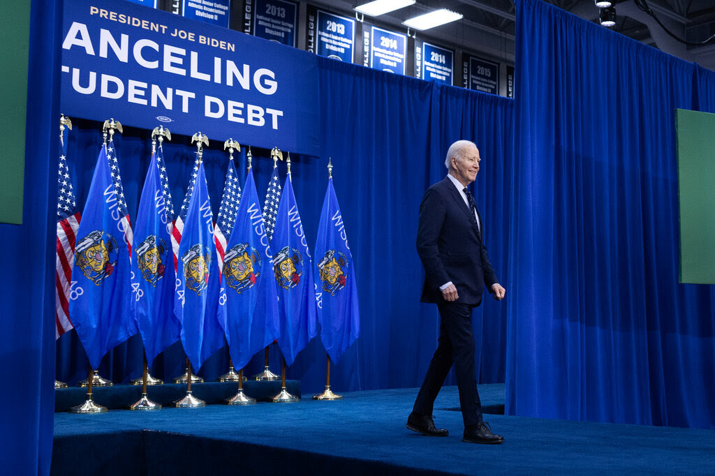 President Biden appears at an event in Wisconsin to discuss his plan to cancel student debt.