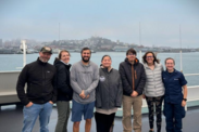 Leg 2 science team on Reuben Lasker ship deck. Credit: NOAA Fisheries/Brittany Schwartzkopf