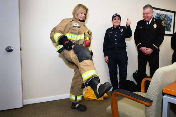 Hahn tries on LA County Firefighter Turnout Gear