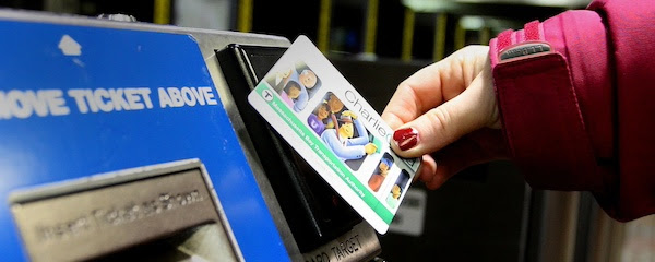 a person taps a charliecard at a turnstile

reader