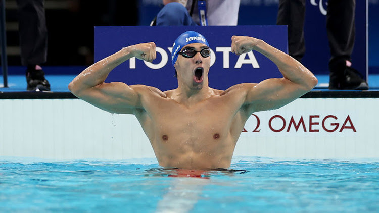 Simone Barlaam of Team Italy reacts after winning gold during the Para Swimming Men's 100m Butterfly S9 Final at the Paris 2024 Paralympic Games. ©Sean M. Haffey/Getty Images