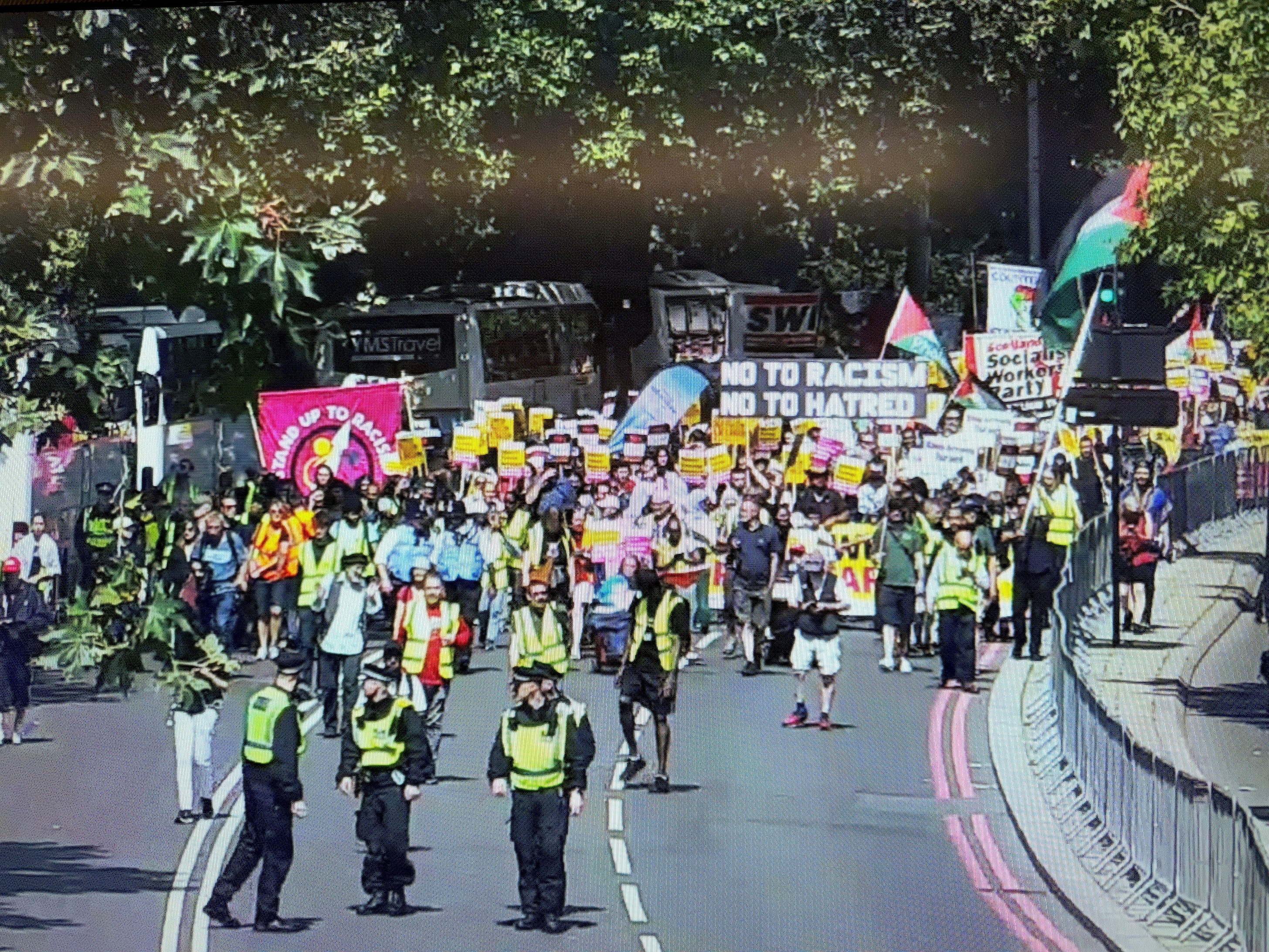 Stand Up To Racism protester on Victoria Embankment