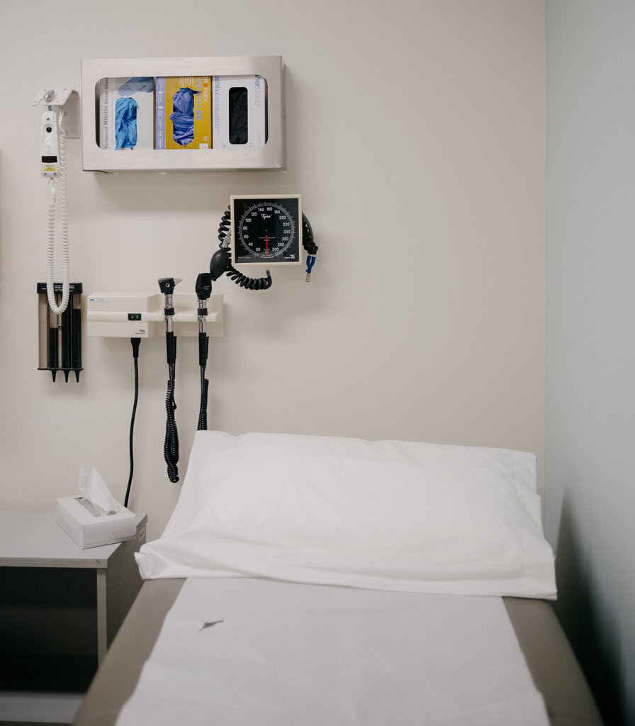 A view of a bed in a hospital room. 