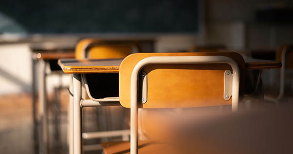 Empty desks in a classroom