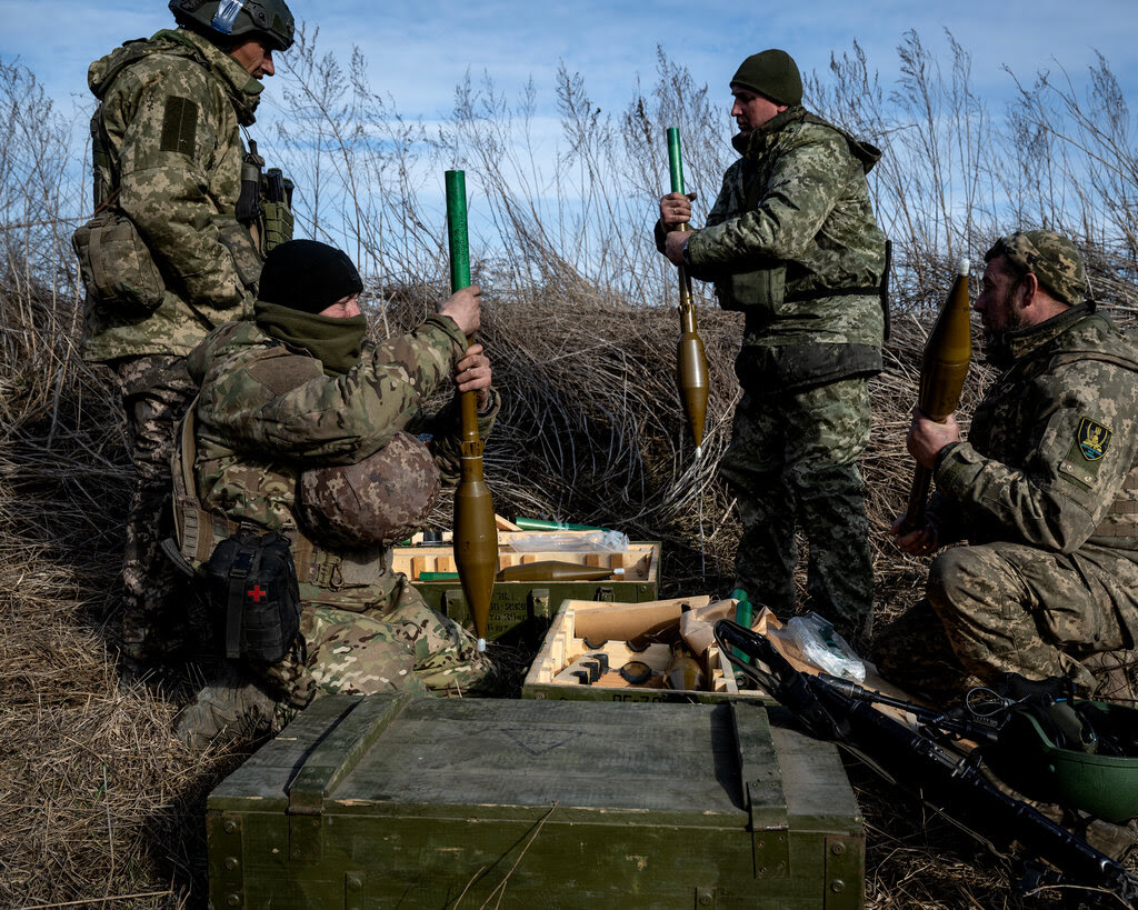 Soldiers loading rocket-propelled grenades for a training.