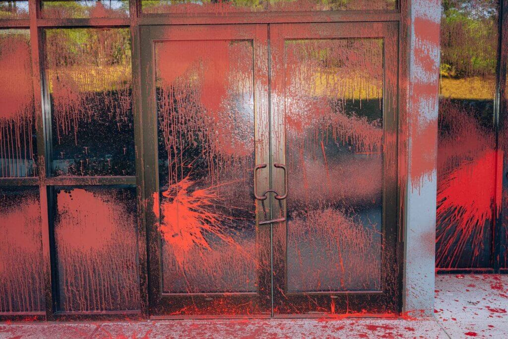 Red paint covers the entrance of the Elbit Systems building in Merrimack, New Hampshire (Photo: Maen Hammad)