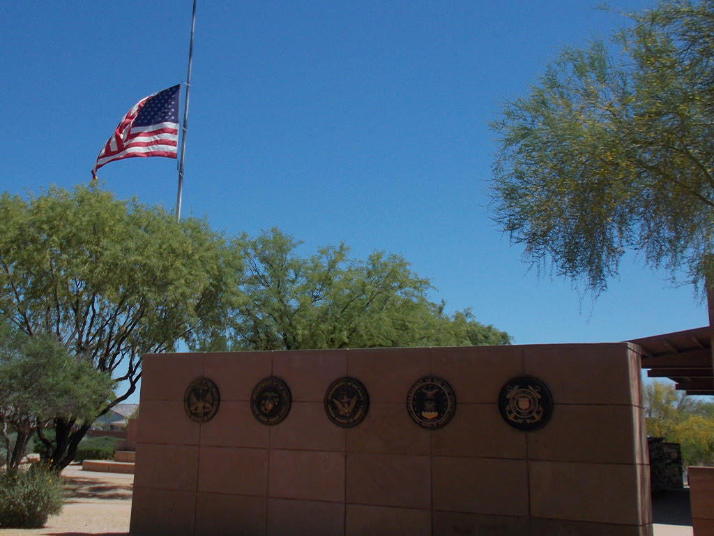 an american flag on top of a building