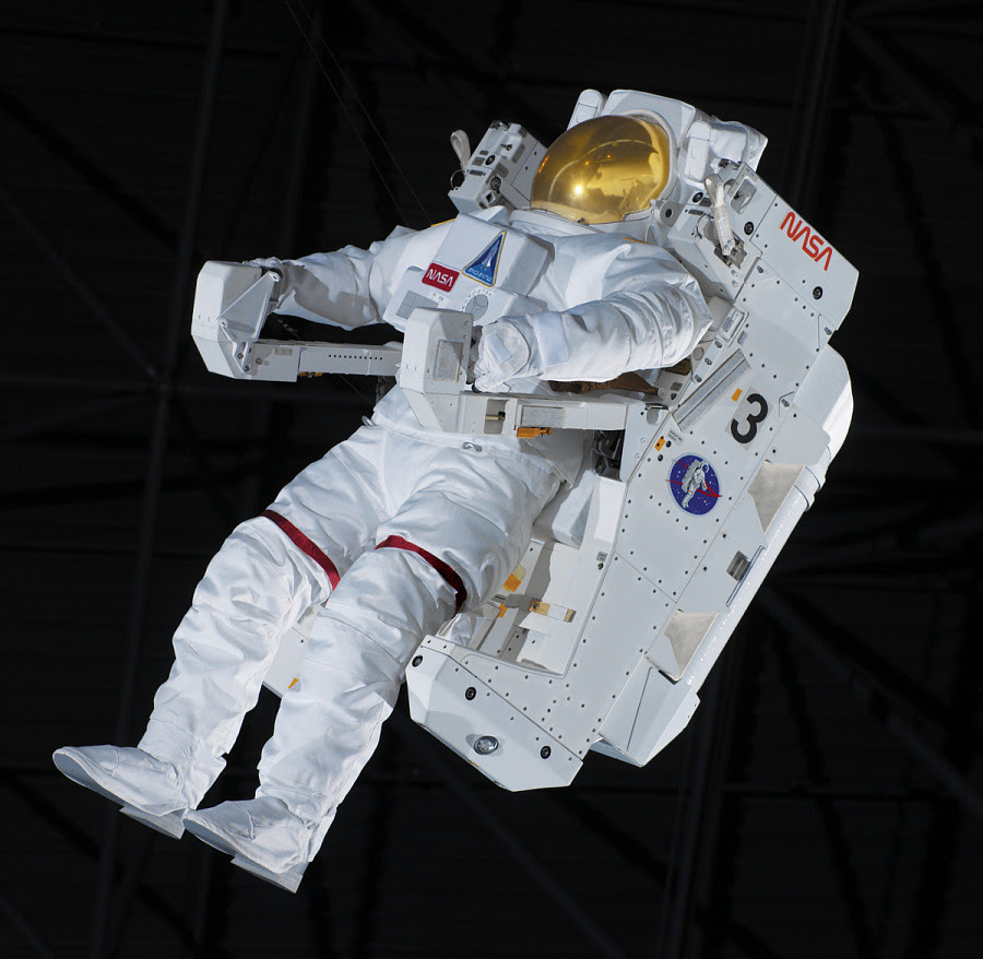 A close of up the astronaut floating untethered in black space