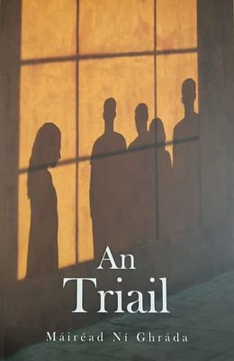 Book cover of An Triail by Máiréad Ní Ghráda, depicting shadows on a wall of a lone woman and a number of men watching her.