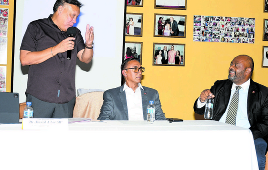 Caroni Central MP David Lee, left, Agriculture Minister Ravi Ratiram and Defence Minister Wayne Sturge at Wednesday’s Budget Consultation in Freeport. PHOTO BY SHASTRI BOODAN
