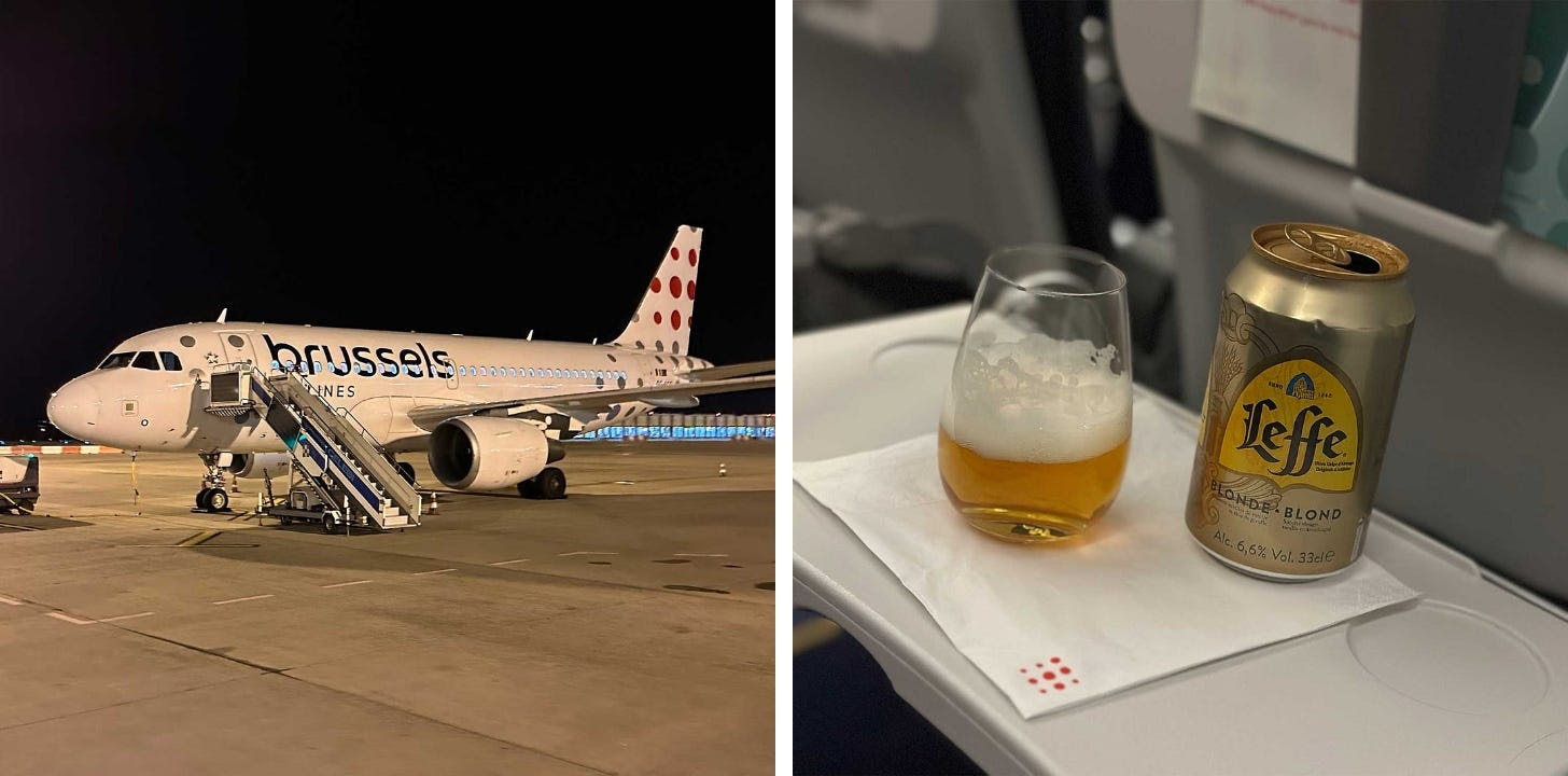 Brussels Airlines Airbus A319 aircraft and a beer on an airplane tray table.