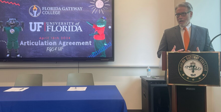 David Richardson, dean of the College of Liberal Arts and Sciences, speaks to Florida Gateway College faculty and students about the Going Gator program, on Thursday, April 18, 2024.