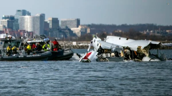 Wreckage from the midair collision is seen in the Potomac River near Ronald Reagan Washington National Airport, Jan. 30, in Washington.