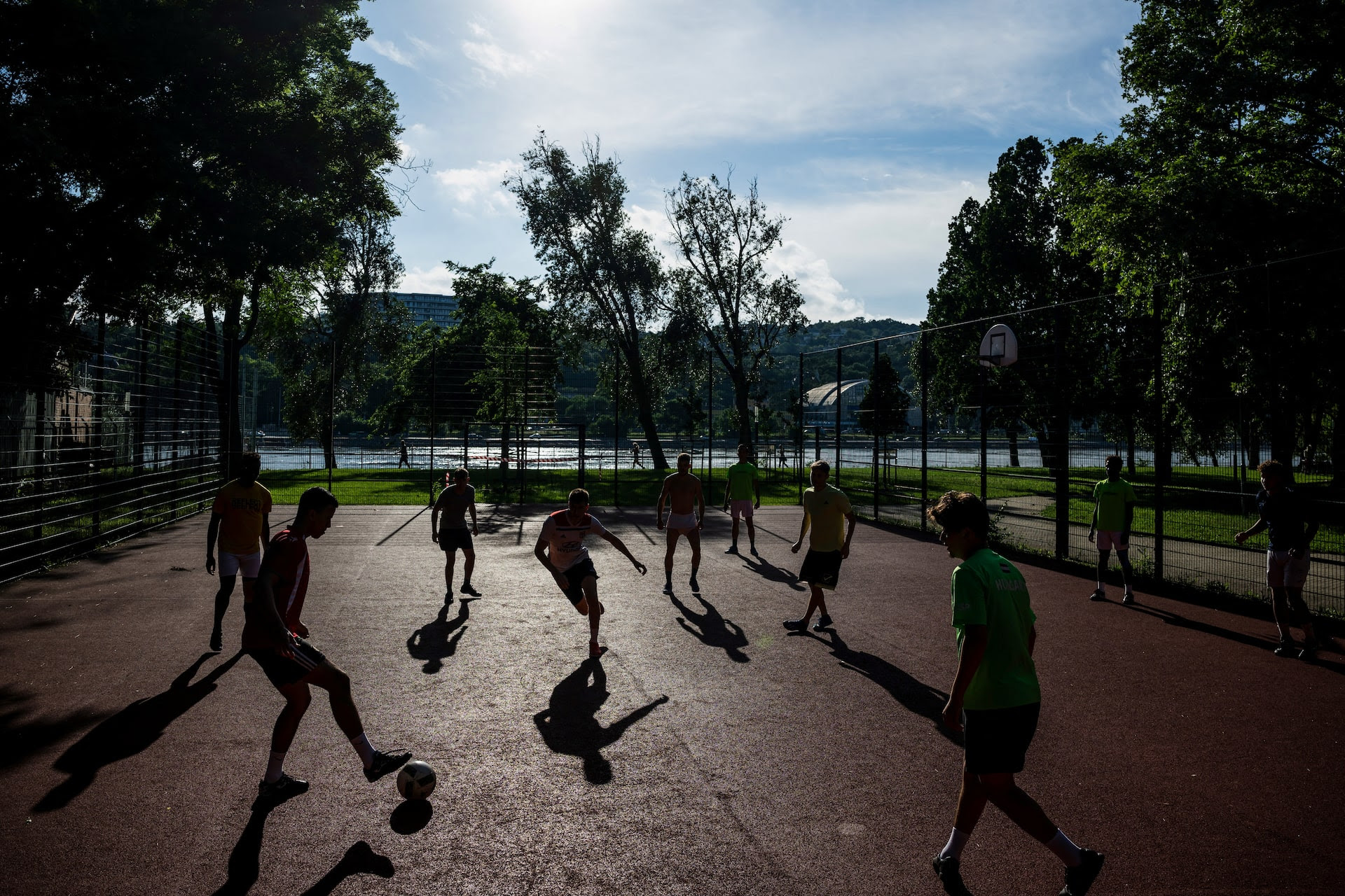 Members of the Oltalom Sports Association soccer team practice during training in Budapest, Hungary, June 4, 2024.