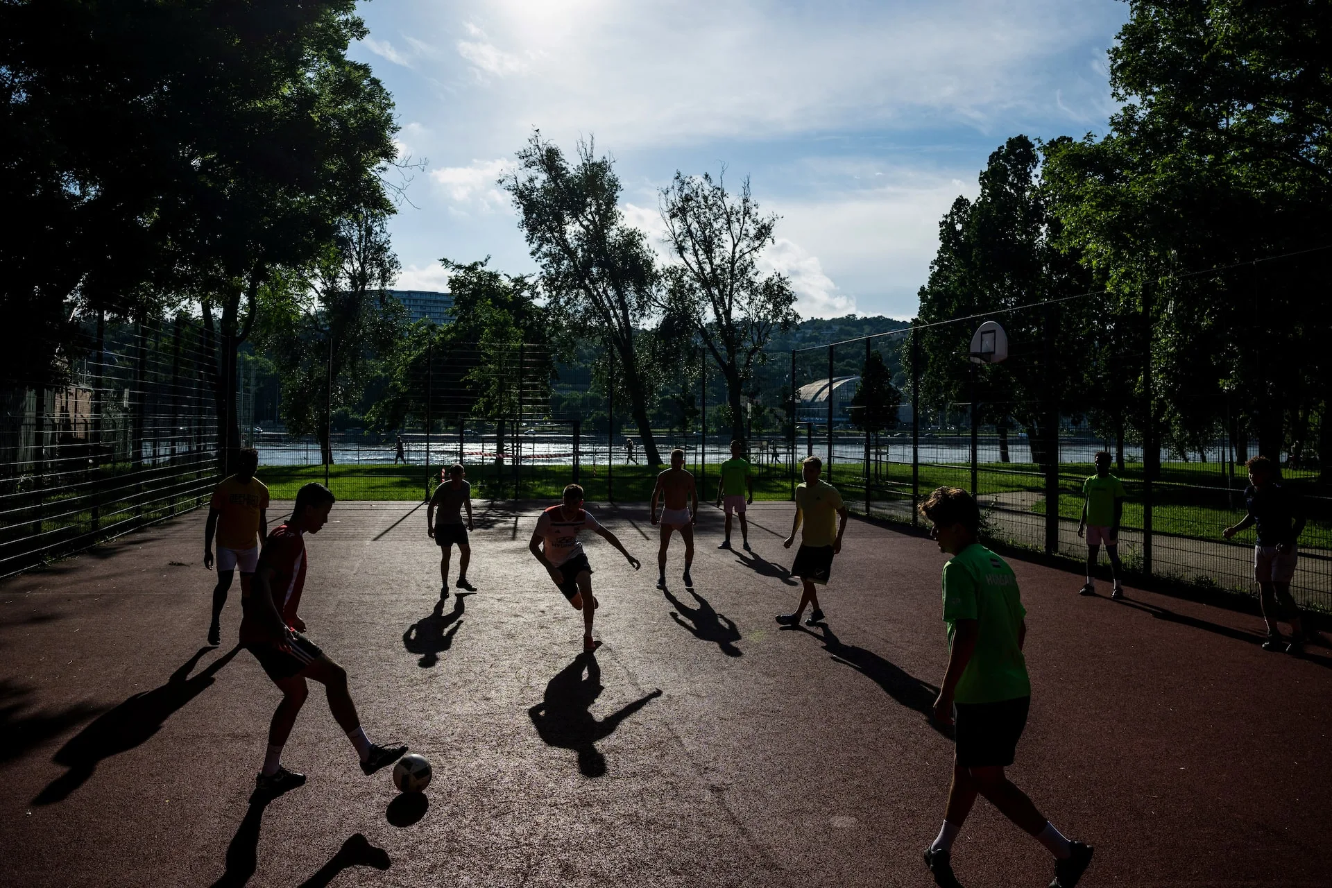 Members of the Oltalom Sports Association soccer team practice during training in Budapest, Hungary, June 4, 2024.