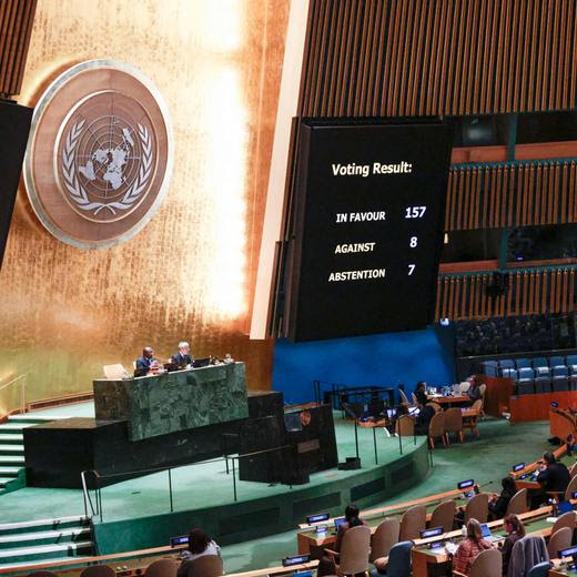 A screen shows the results of the vote on the resolution entitled "Peaceful settlement of the question of Palestine" at the General Assembly 46th plenary meeting on December 3, 2024, at the UN headquarters in New York City. (Photo by Kena Betancur / AFP)