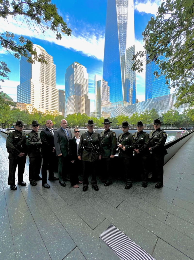 ECOs stand in front of World Trade Center Memorial