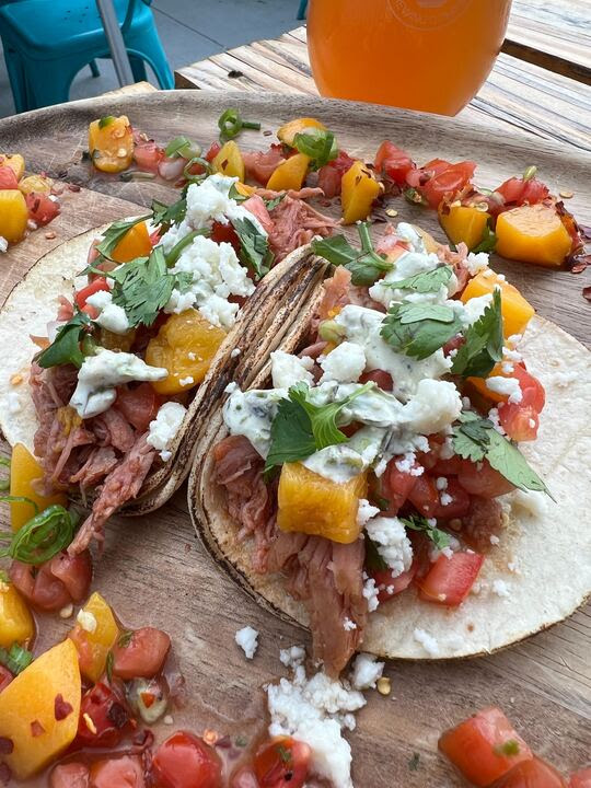 photo of 2 peach pork picante tacos