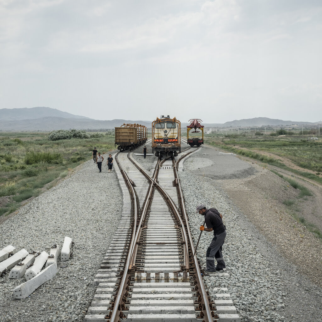 A man working on a railway track.