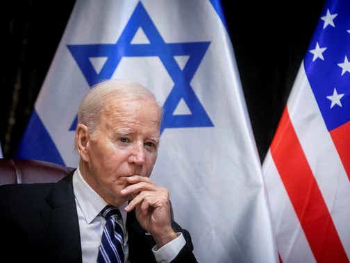 U.S. President Joe Biden pauses during a meeting with Israeli Prime Minister Benjamin Netanyahu in Tel Aviv, Israel, iin October 2023.