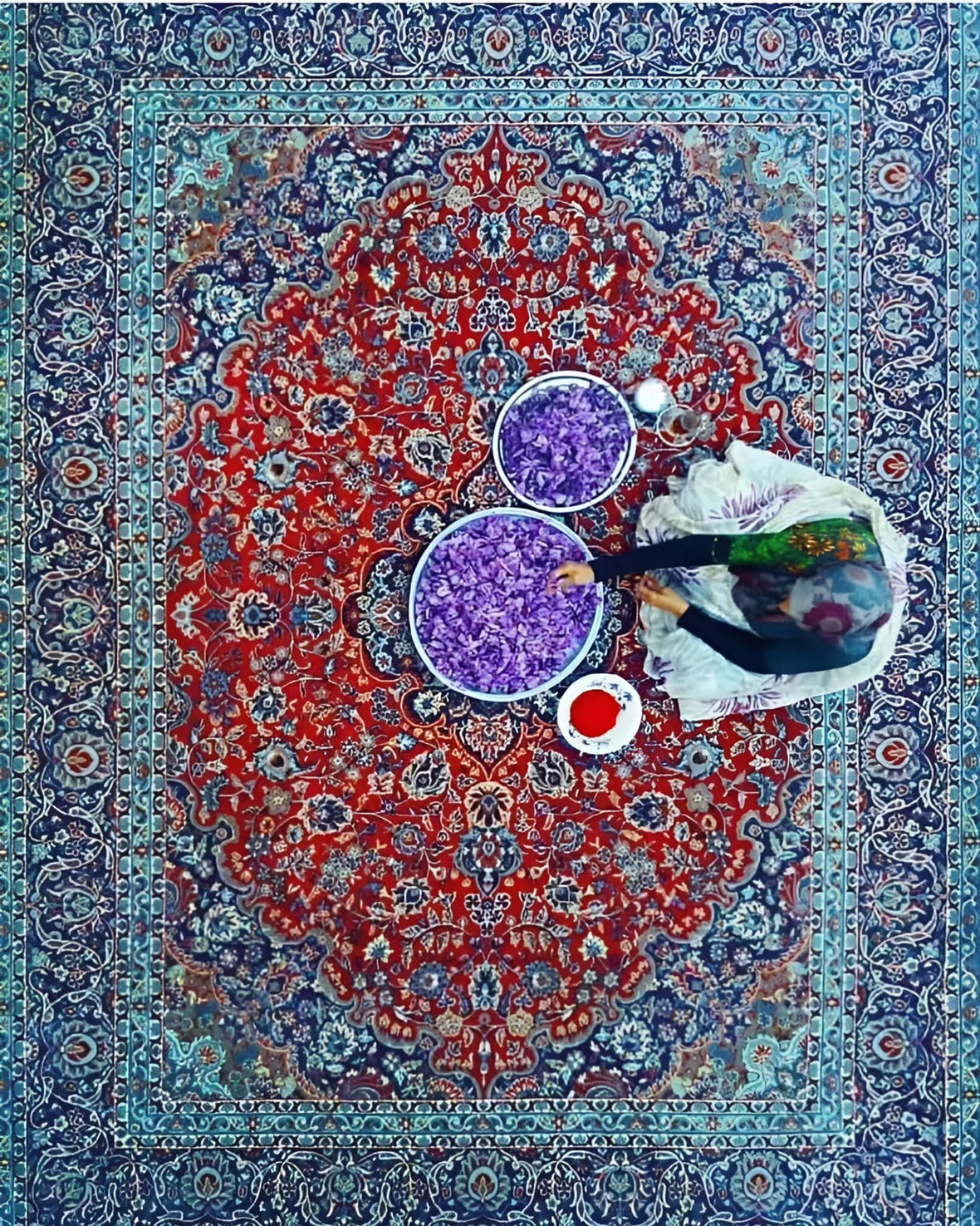 Iranian woman working with saffron