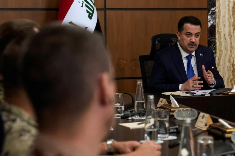 Iraqi Prime Minister Mohammed Shia al-Sudani chairs the first session of negotiations between Iraq and the United States to wind down the International Coalition mission in Baghdad, Iraq, January 2024