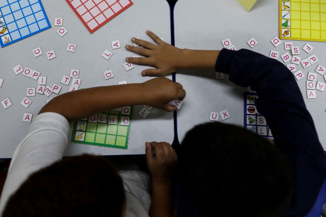 Children make words during a class making up for the shortfall aggravated by the pandemic at the city public school Conde Luiz Eduardo Matarazzo, in Sao Paulo, Brazil June 23, 2022. REUTERS/Amanda Perobelli