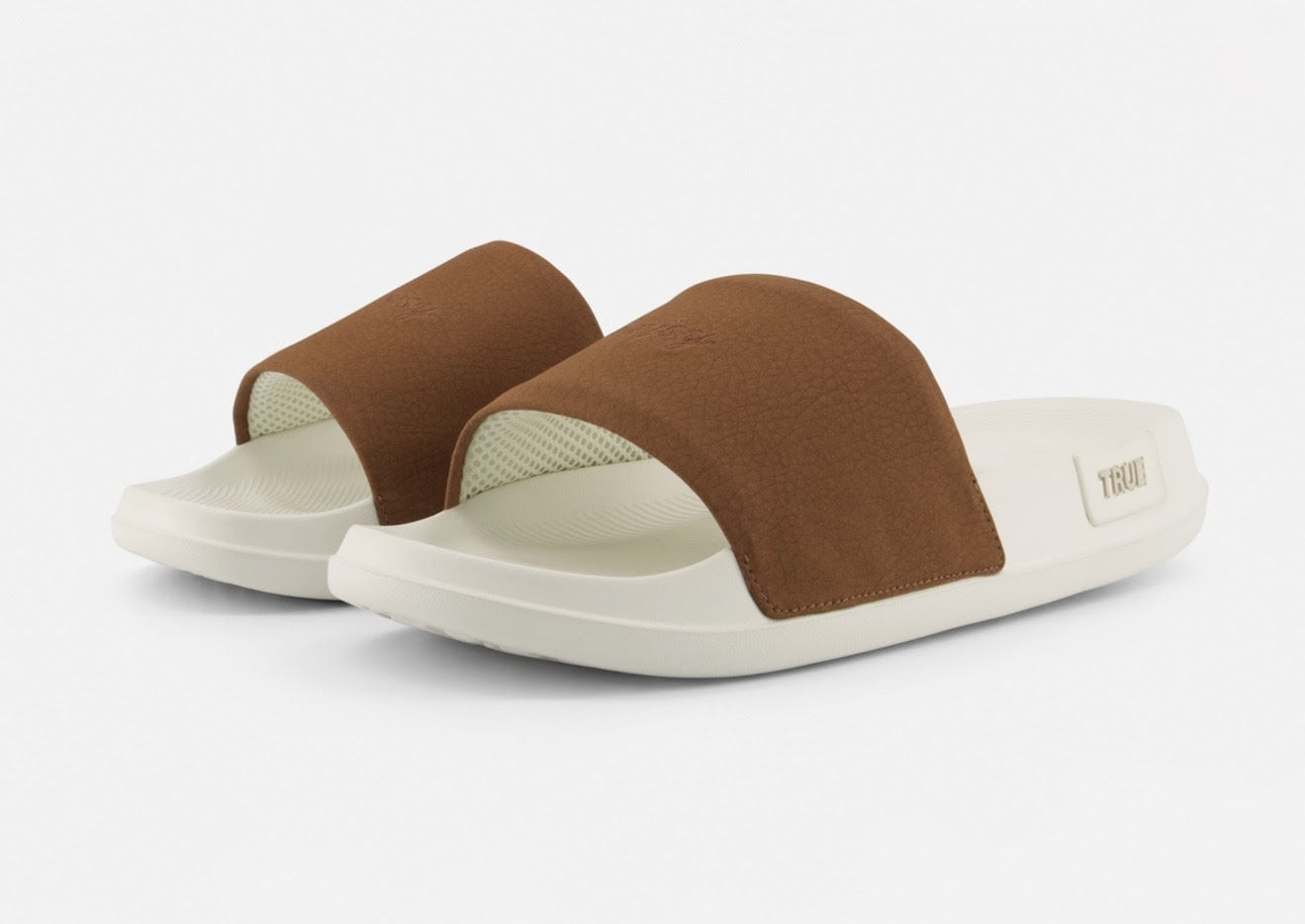 A pair of brown sandalsAI-generated content may be incorrect.
