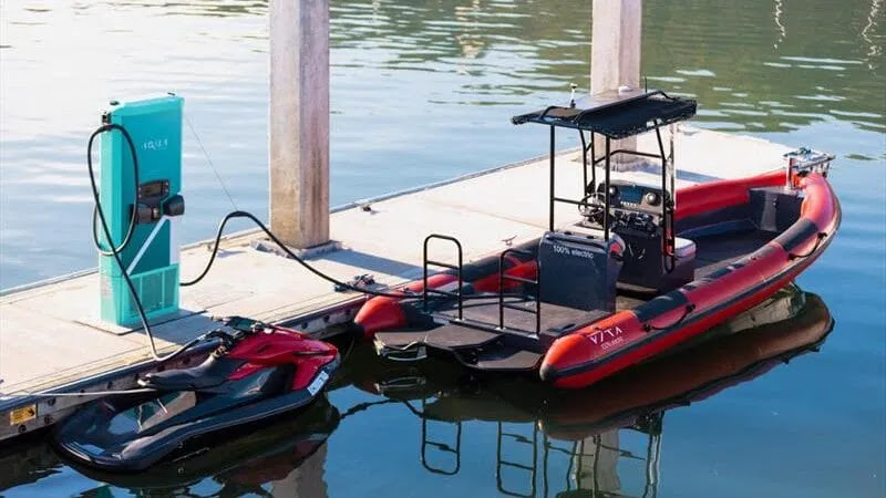 Taiga and Vita electric watercrafts connected to Aqua superPower's fast charger in the San Francisco Bay. Image courtesy of Taiga Motors