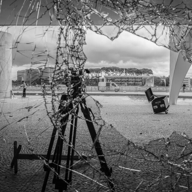 The outside of Brazil’s presidential palace, seen through a broken window.