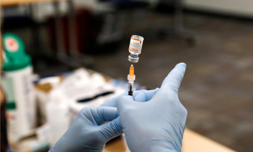 A nurse prepares the Pfizer COVID-19 vaccine in Southfield, Mich., on Nov. 5, 2021. (Jeff Kowalsky/AFP via Getty Images)