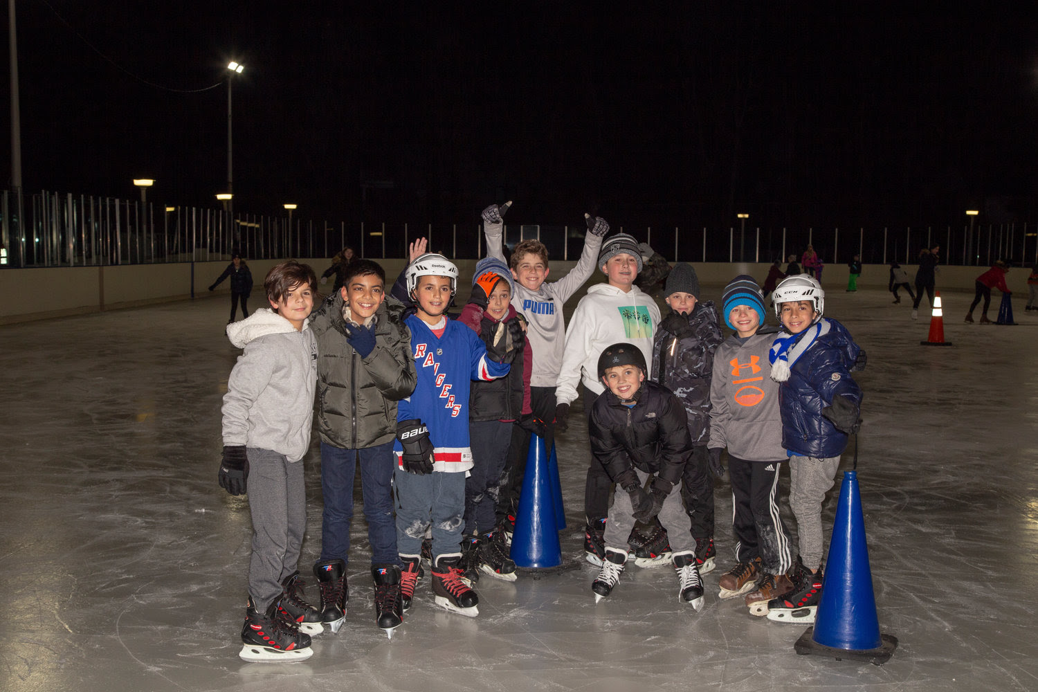 On the Grant Park ice rink at the Chabad of Hewlett’s Hanukkah on Ice from left Johnathan, Tomir, Nathan, Roy, Justin, Orr, Shaan, Stefano, Ari and Merrick.