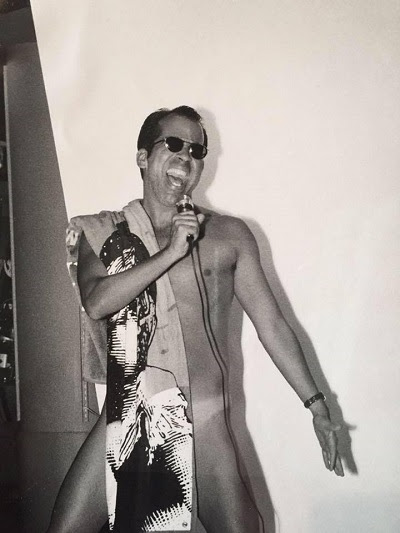 Richard in South Beach (Circa 1990) singing in the storefront window of Meet Me in Miami