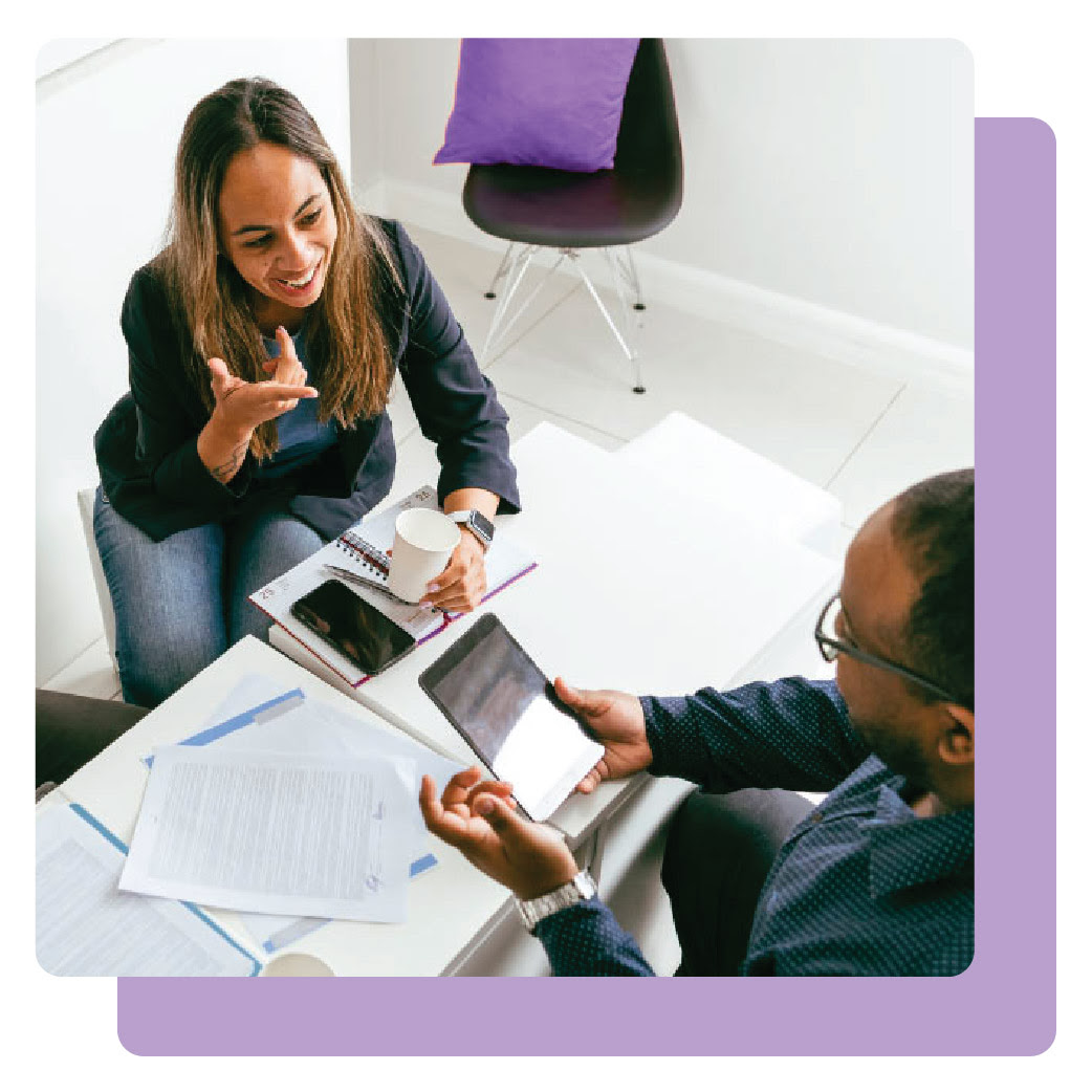 Two people discussing fundraising