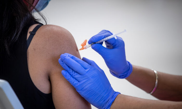 Spike in COVID Vaccine Side Effects on Menstrual Cycles 'Only the Tip of the Iceberg': Doctors