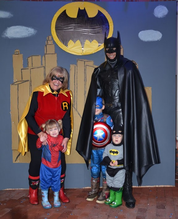 Gov. Jay Inslee, First Spouse Trudi Inslee, and three of their grandchildren donned superhero garb for Halloween in 2017. 